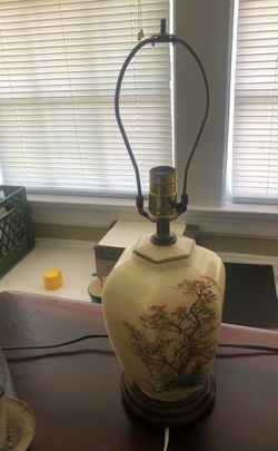 Vintage lamp. Porcelain body wood base