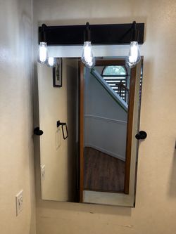 Vanity, light and mirror