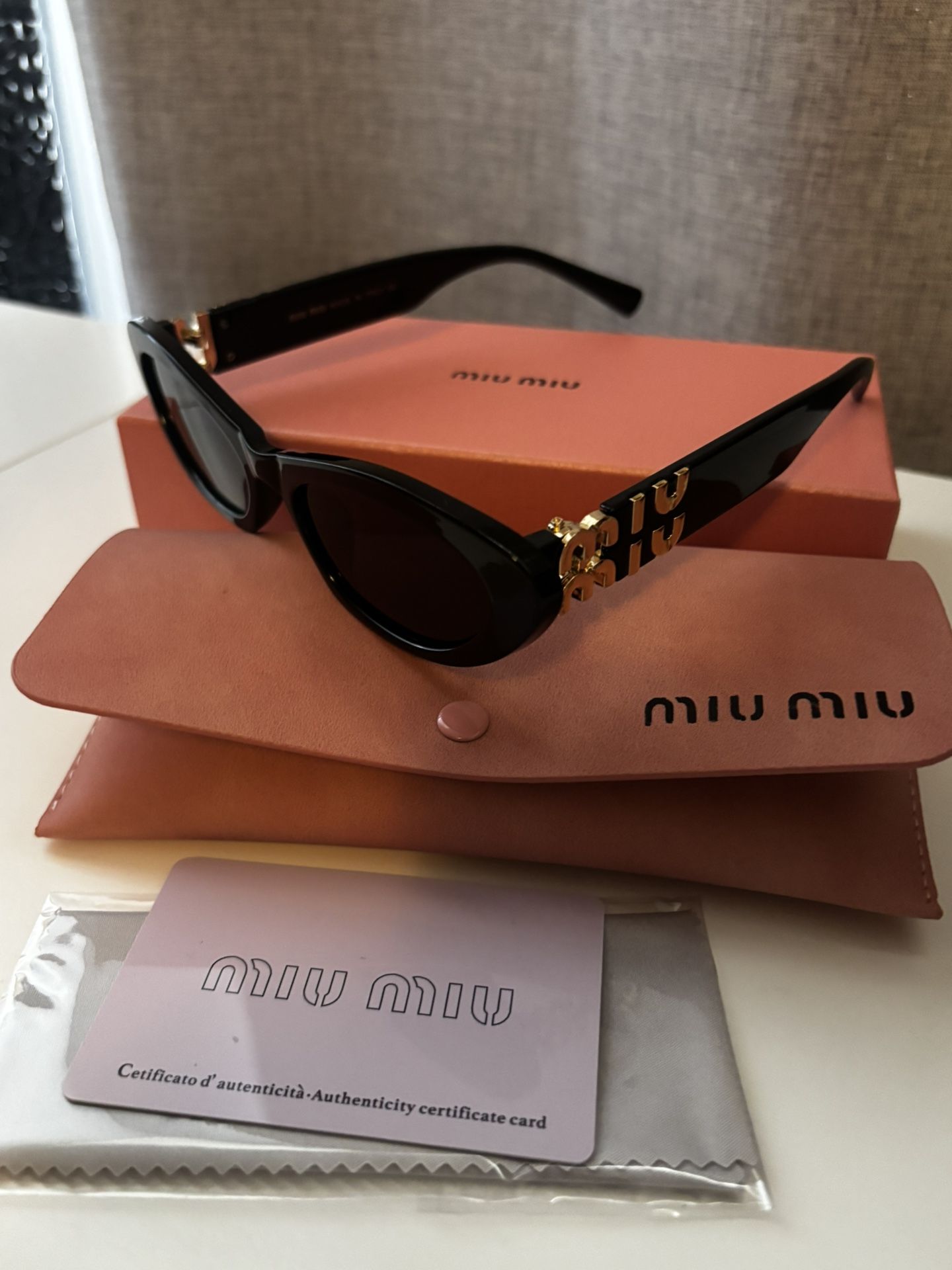 MIU MIU SUNGLASSES
