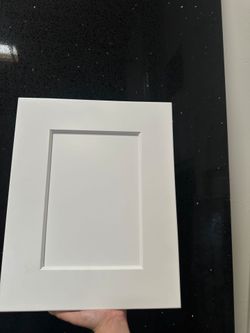 White shaker cabinets and quartz countertop