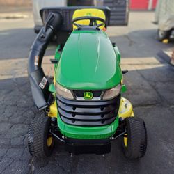 For Sale John Deere X300 with 18.5HP kawasaki with 42"Deck with Bagger $2,200 has 600hrs