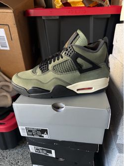 Brand new Nike air Jordan 4 Undefeated Sz 9