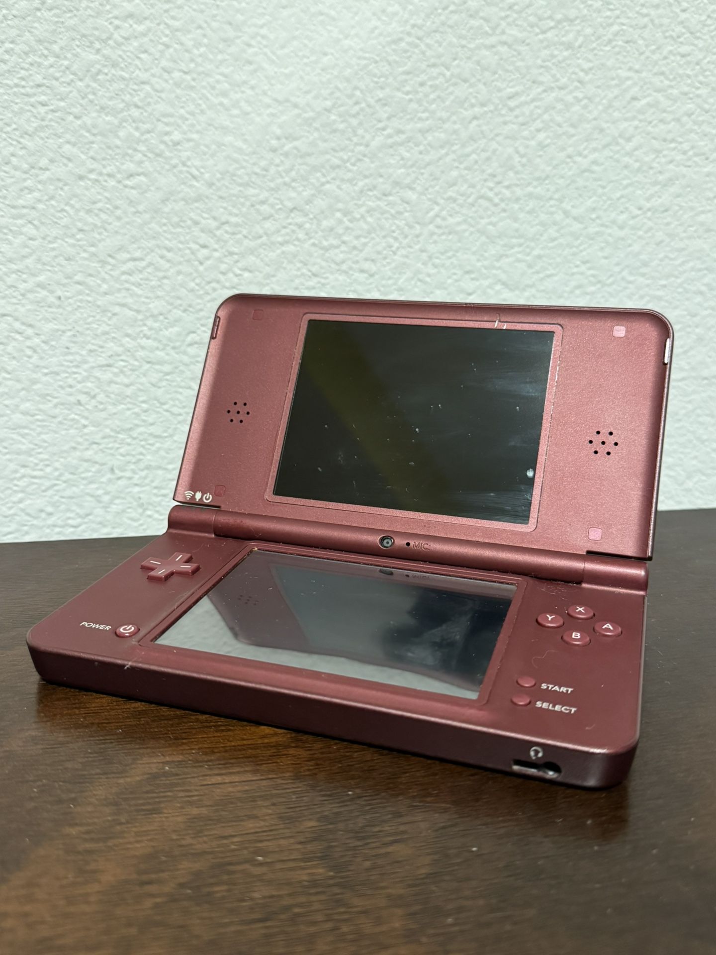 Nintendo DS XL + 4 games + charger