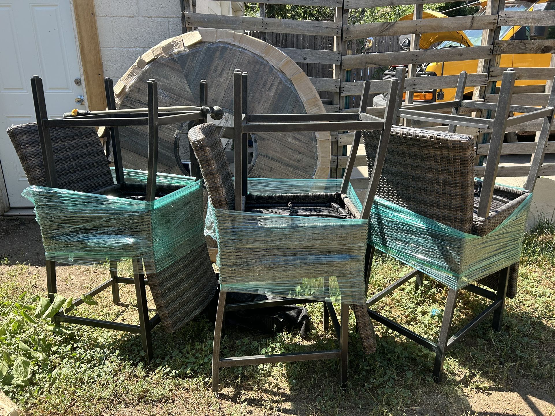 Outdoor Table + Chairs With Firepit In Middle