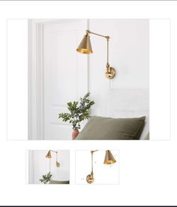 Swing arm wall lamp