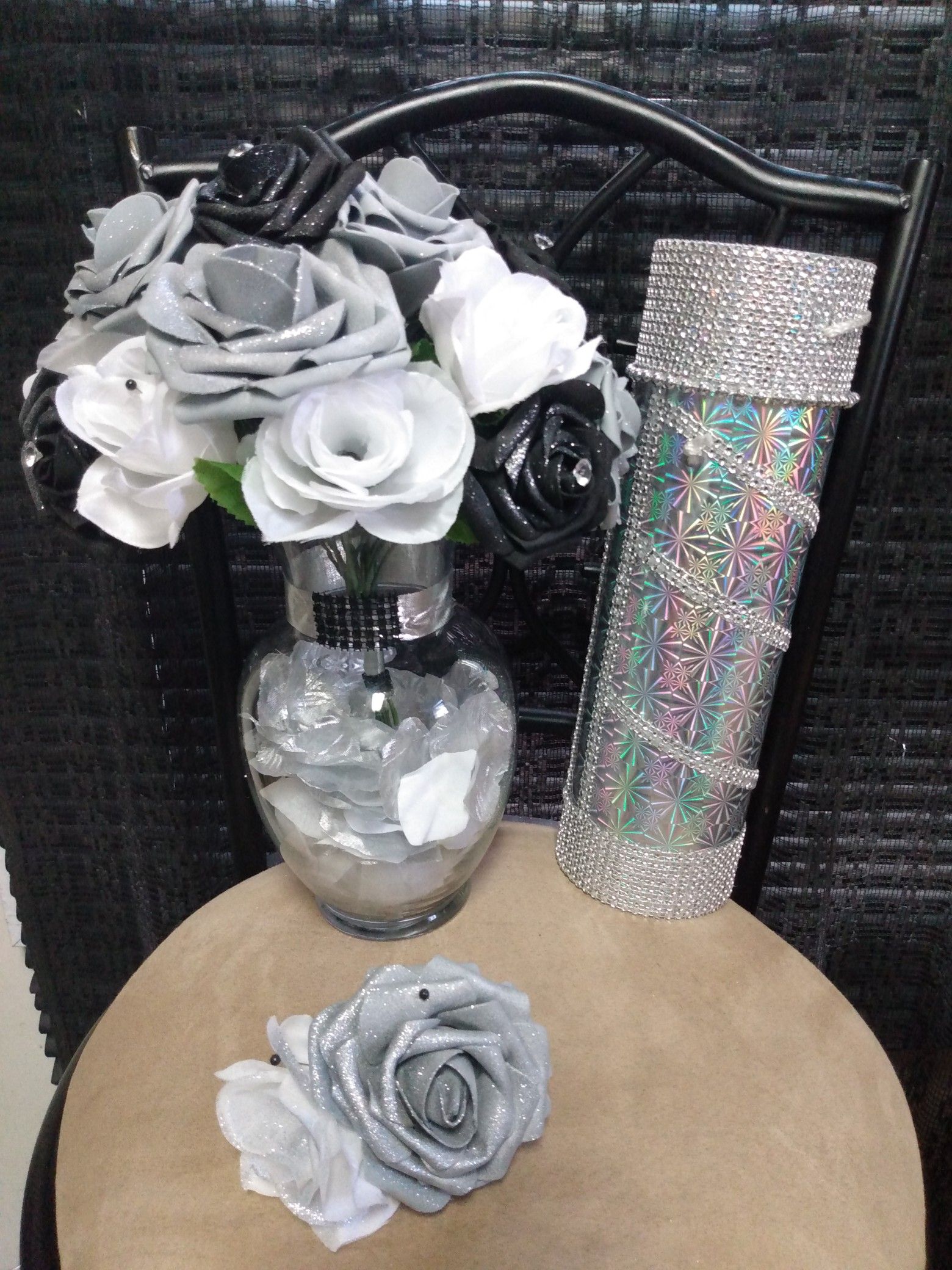 $45 Black/ White/ Silver roses with black/ white roses petals in vase, Includes: boutonniere, Silver rhinestones on Wine gift box.
