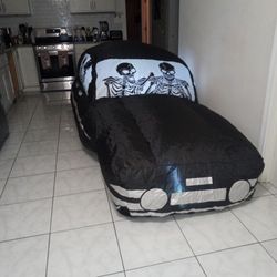 A Blow Up Halloween Cadillac In Good Condition
