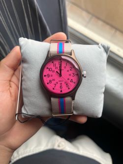 pink-dial Timex watch.