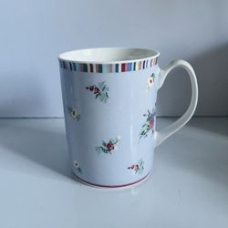 Laura Ashley Mug 12 Oz. Very Light Lilac Color  With Little Flowers All Around including the handle. Comes from a smoke free environment.  