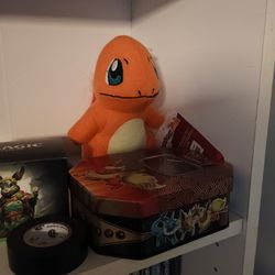 Charmander plush with Pokemon Card Tin