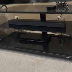 Free black glass TV stand!