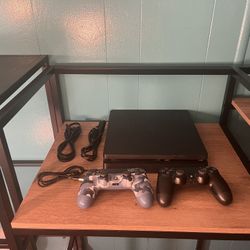 PS4 slim 1Tb + 2 Controllers & All Cords 