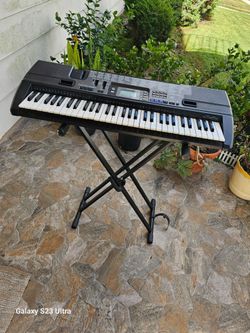 CASIO Portable electronic  keyboard 
( CTK 720 ) W37.5" X D 14" X H 6" & ORIGINALLY  STAND