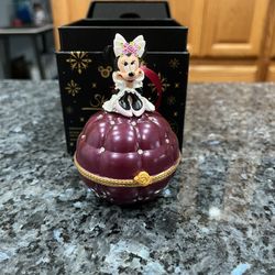 Disney Minnie Mouse Engagement Ring Proposal Box & Christmas Ornament.  The inside has  “Will you marry me?”.  You can remove the ring and put your ri