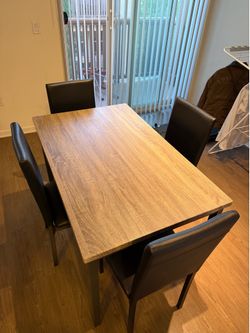Wood Dining Table with 4 Black Leather Chairs
