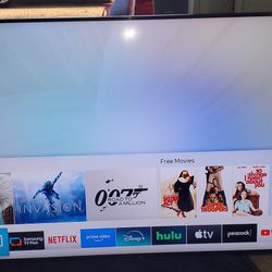 SAMSUNG 57" QLED SMART TV. (FULLY FUNCTIONAL)