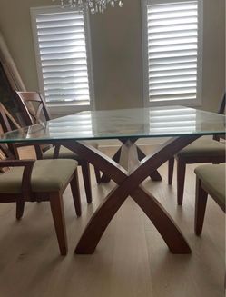 Glass table with 6 chairs