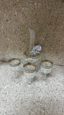 Vintage edged gold trim, decanter with three stemware glasses