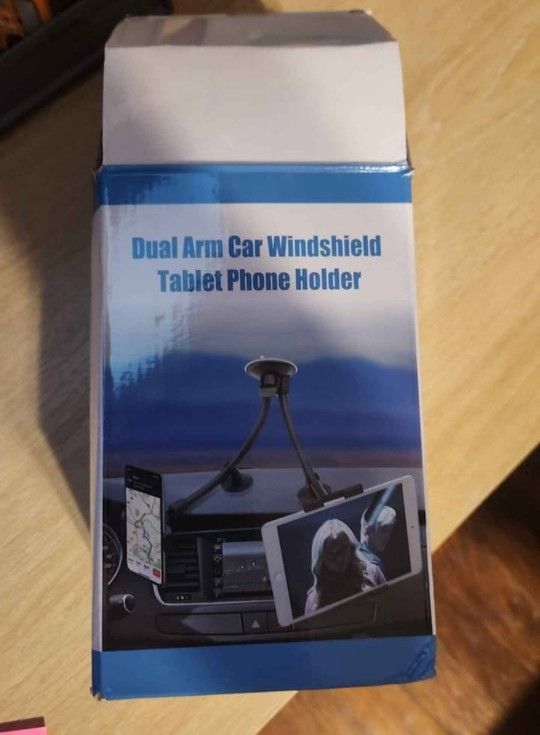 Dual arm phone and tablet holder for the car