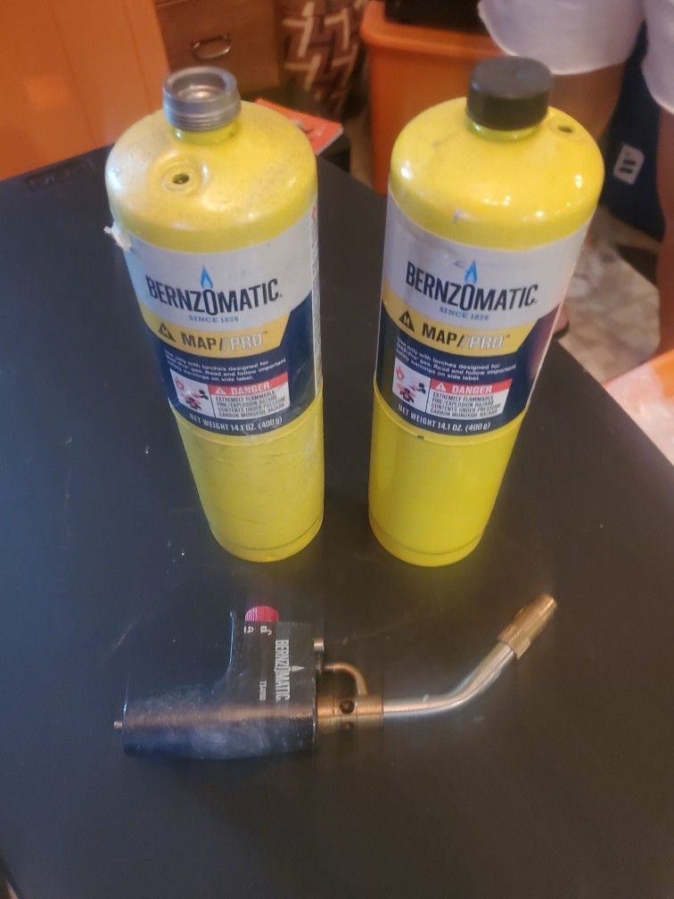 2 Gas Tanks And Torch