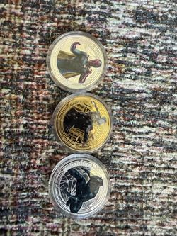 Lot of (3) collectible coins. Thor/gold plate, Black Panther/silver plate, Vision/silver plate (Avengers coins) With clear protector cases.