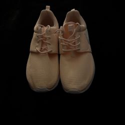 Nike Roshe One sneakers in a Crimson Tint and White colorway