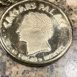 A Caesar Palace Gold Plated Pendant With 24 Inch Gold Plated Chain