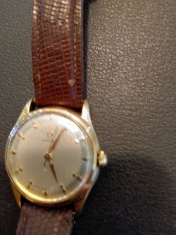 Omega lineup when the first seamsters made it's in excellent condition no scratches no nothing 14 karat gold
