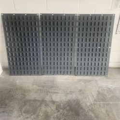 Metal wall panels w blue bins 