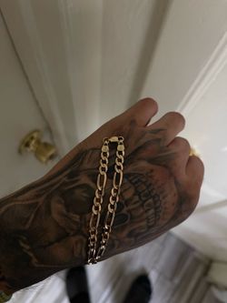 14kt gold figaro bracelet