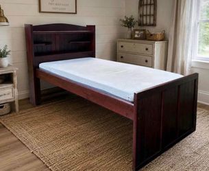 Twin bed with bookshelf headboard