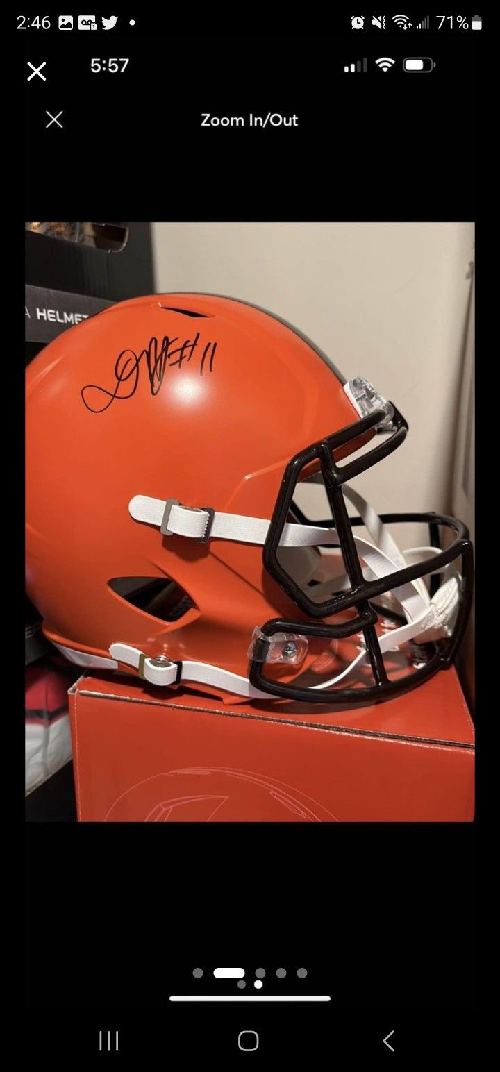 Mark Brunell Jags Full Size Helmet Signed And Authenticated And A Dinovan Peoples Jones Authenticated Helmet Signed As Well And Certified