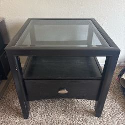 Black glass top end table with drawer