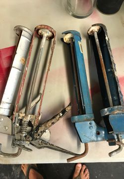 Caulk guns