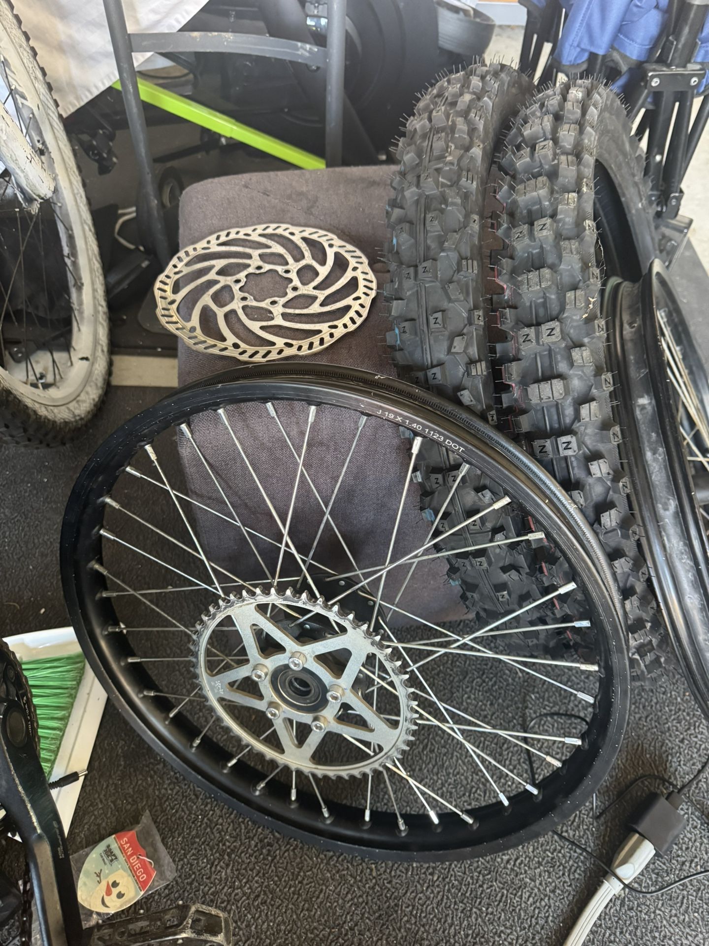 surron rims with fresh rubber ready to be put on
