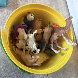 Bucket of Animal Figurines