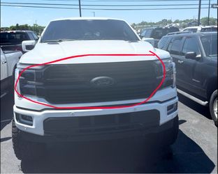 Grille with lighted emblem and camera hole off a 2024 F150