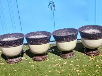 Large plastic planters $ 50 all 4