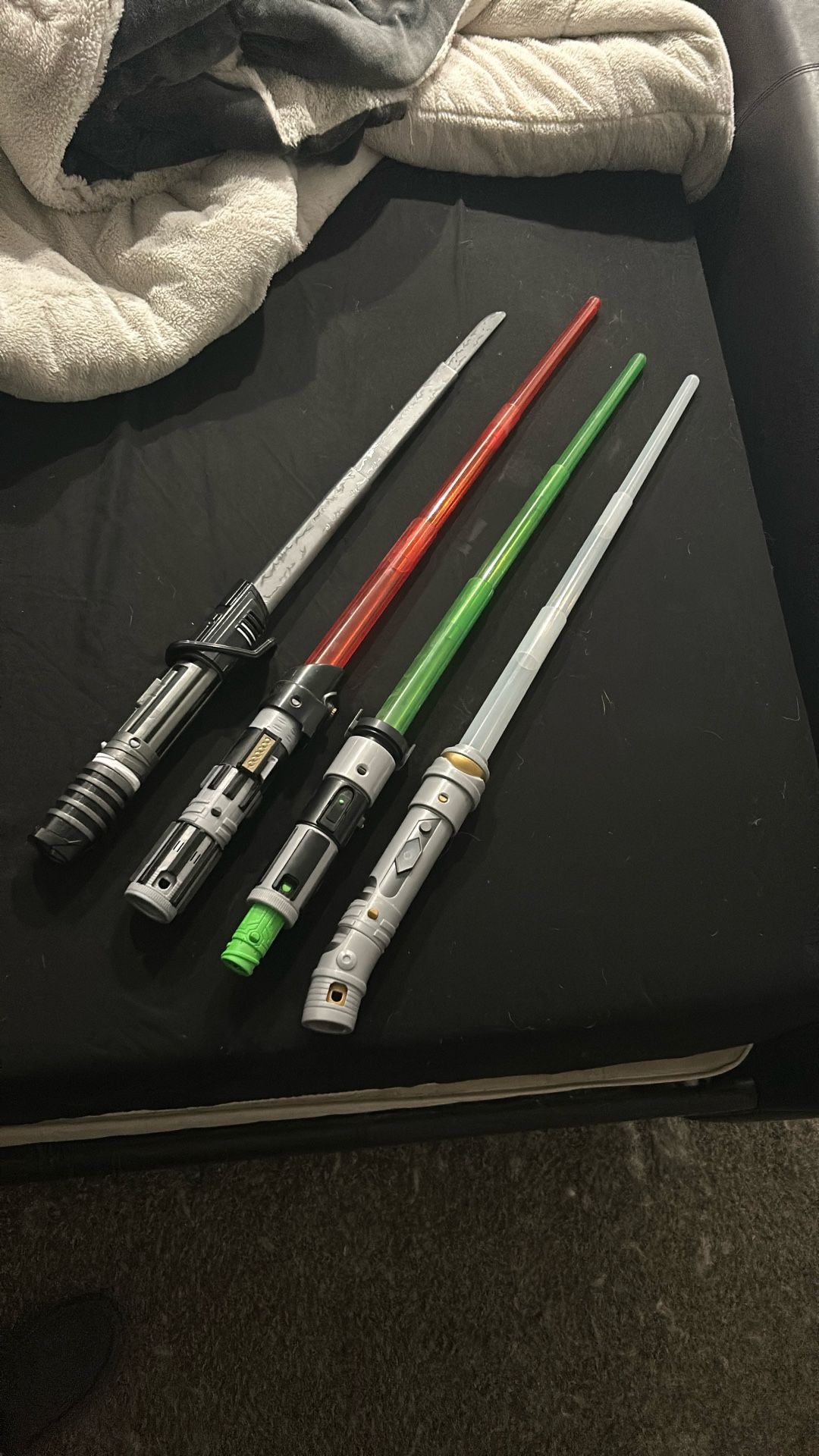 Star Wars forge lightsabers. Yoda, Darth Vader, Ahsoka, and The Mandalorian dark saber.
