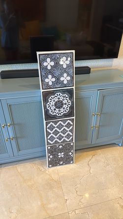 Blue and White Art Work 4 pictures 12" x 12" each.