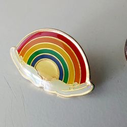 1" Gold Rainbow Lapel Shirt Dress Pin. New. Makes a great holiday Christmas gift or stocking stuffer. Ships via USPS. 

Buy 3 or more items from my st