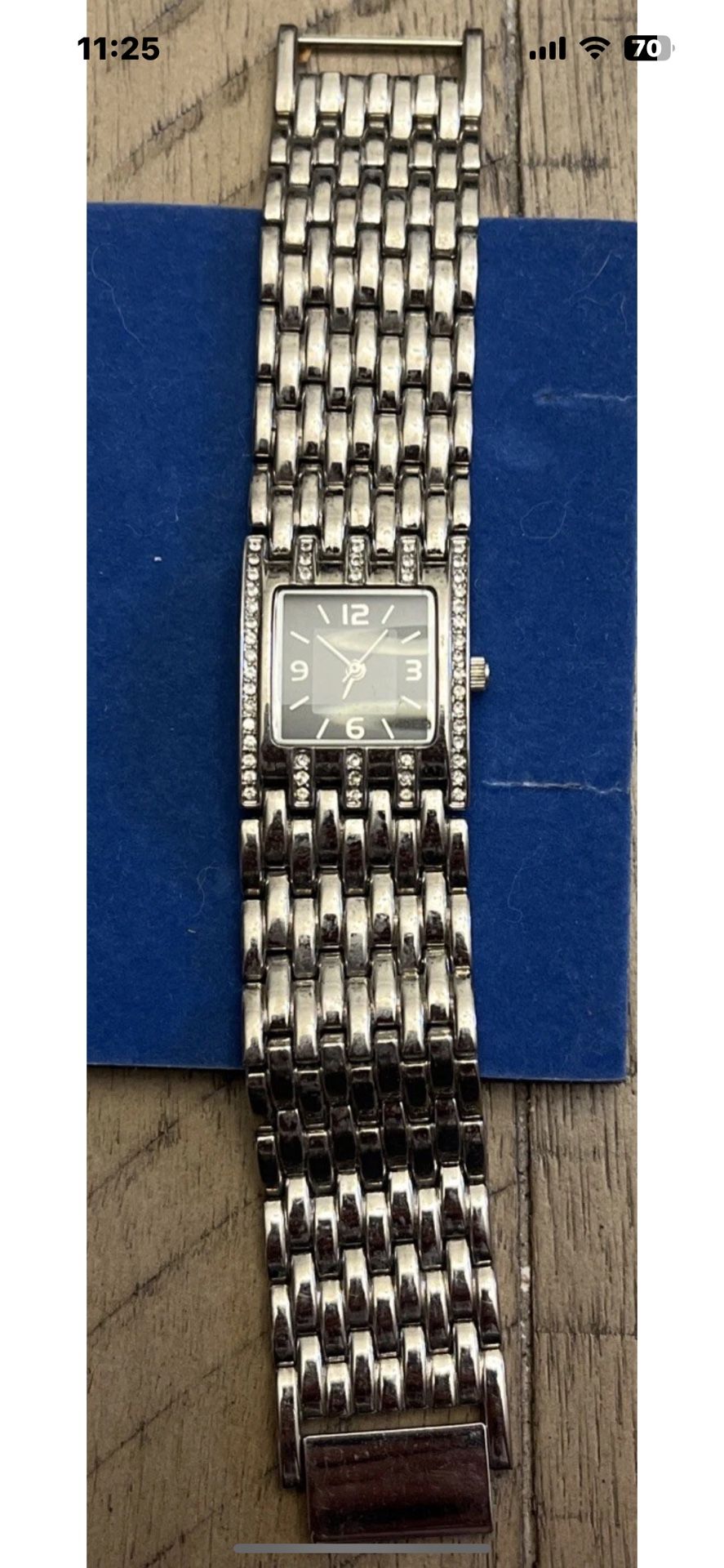 Allude brand Silver toned watch.