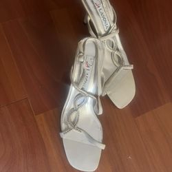 Beige and silver women’s kitten heels