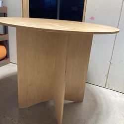 Round wood accent table