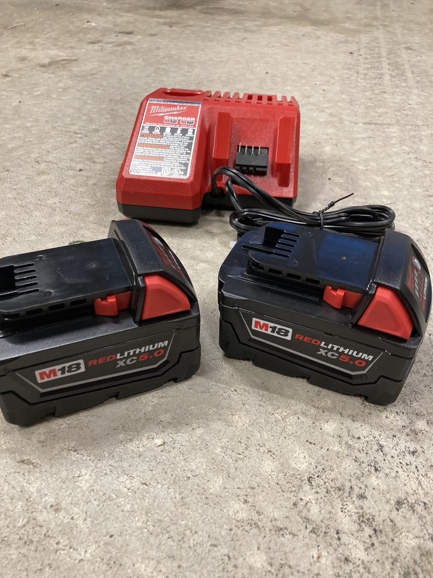 2 New Milwaukee M18 5.0 AH Batteries & Charger 