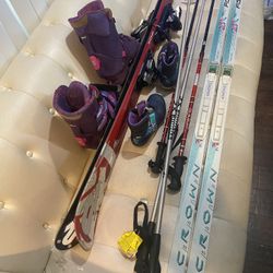 Skis for sale two sets of skis poles and boots
