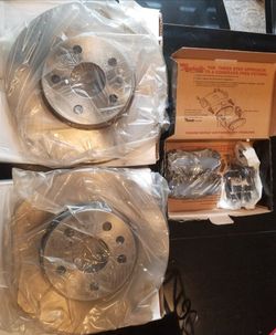 Brand new ceramic front brake pads and rotors for GMC, Chevy, and Buick
