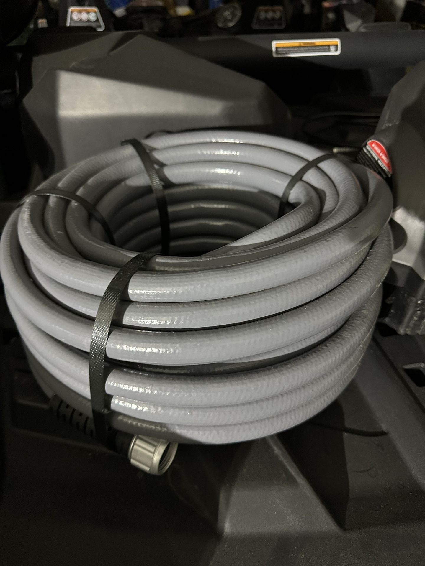 RYOBI pressure washer and water hose