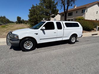 2000 ford f1150 xlt v8 triton runs an drives clean title