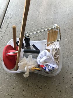 One paint bin with handle filled with goodies